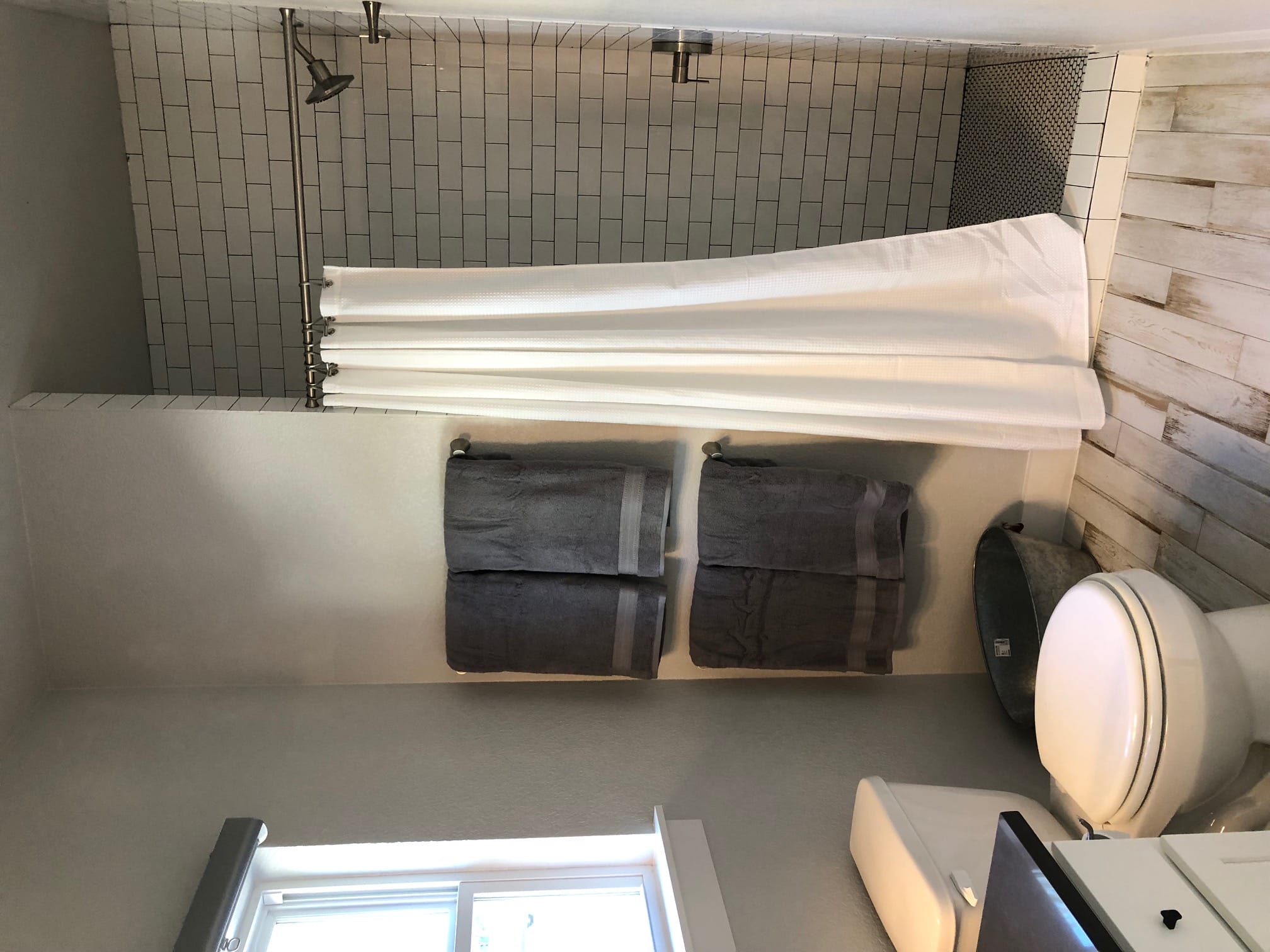 Farmhouse bathroom with subway tile in Jackrabbit Cottage