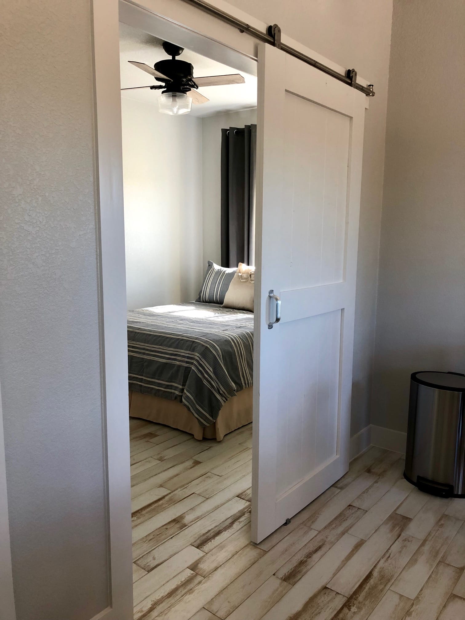 View into the Jackrabbit Cottage bedroom from hallway