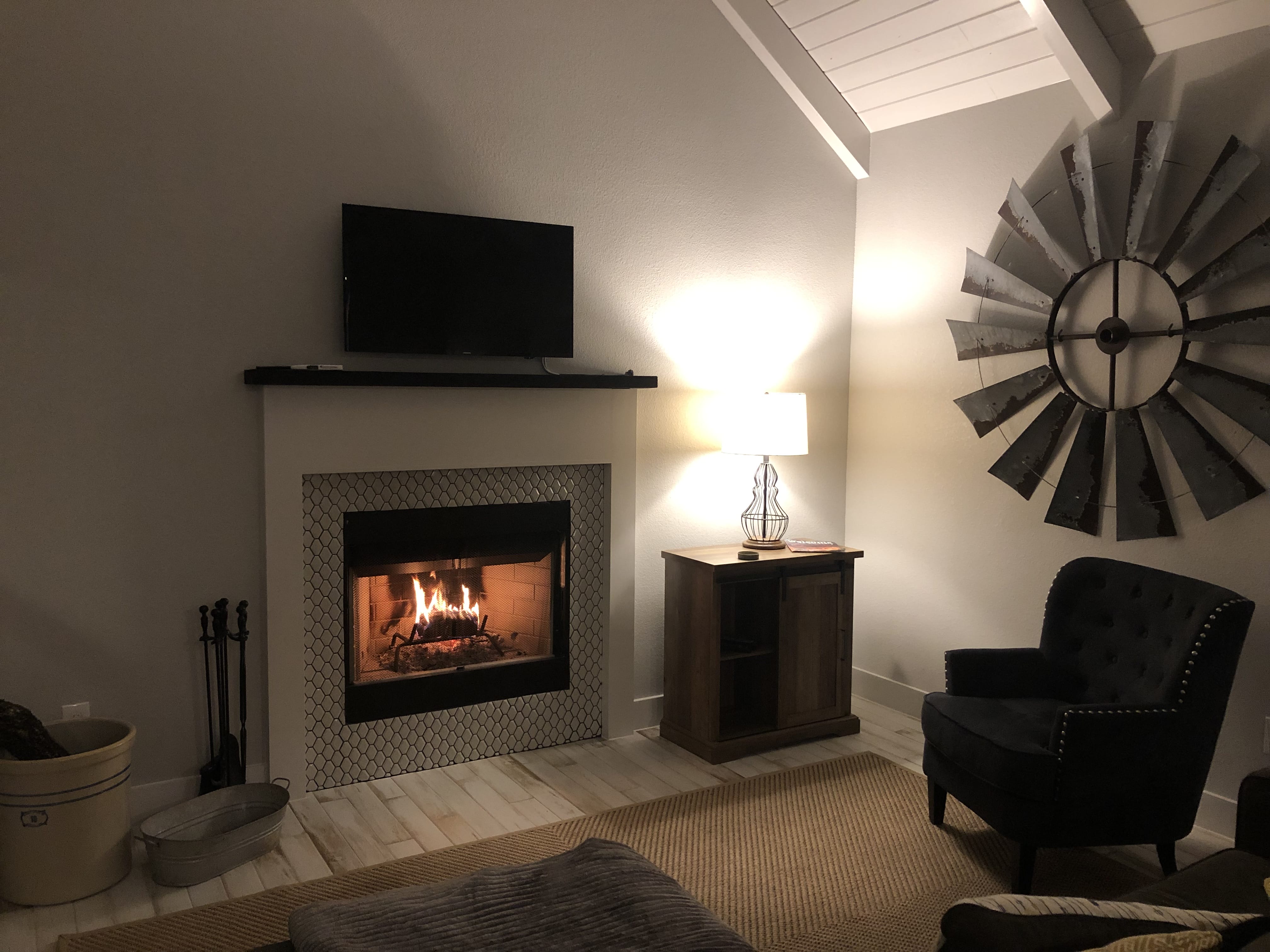 Summermoon Cottage living room with fireplace and rustic decor
