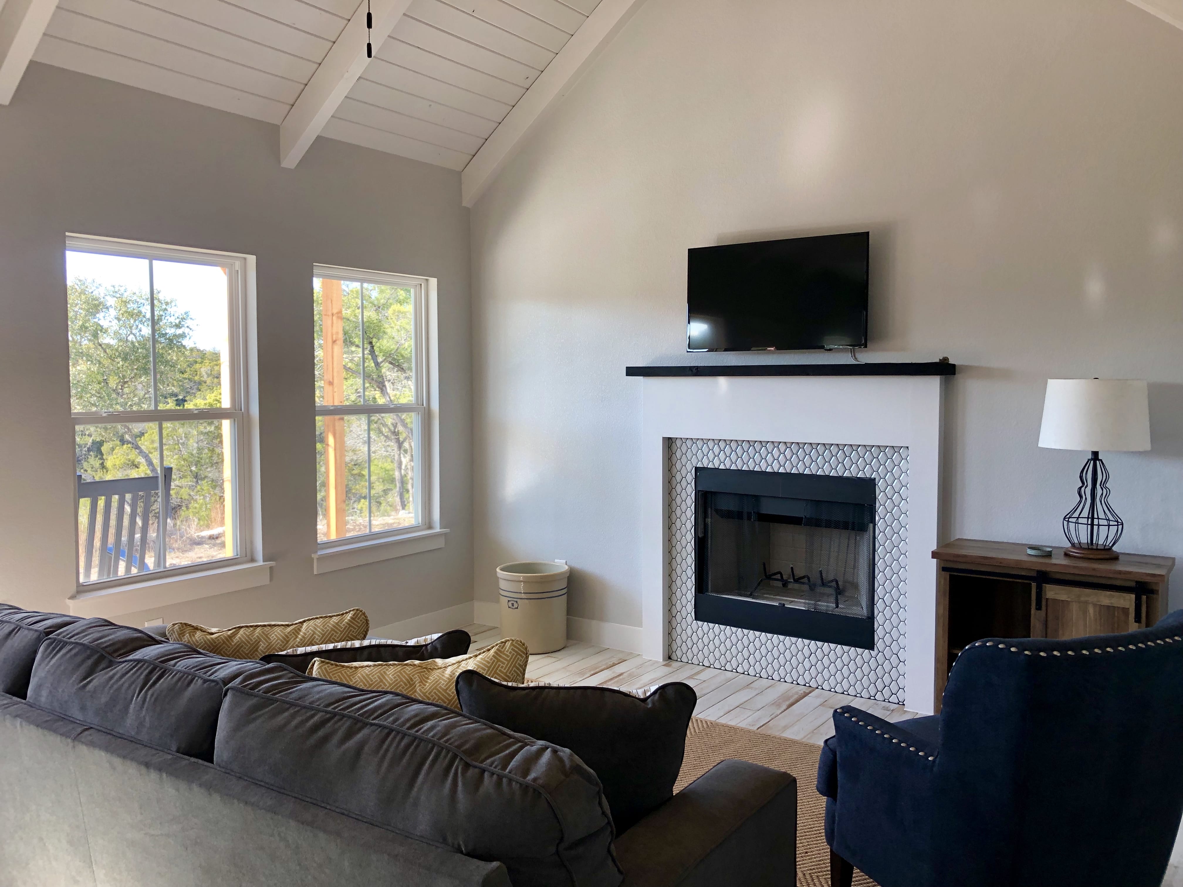 Fireplace with canyon views in Summermoon Cottage living room